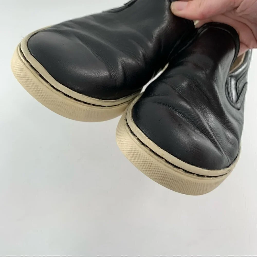 Ugg slip on sneakers size 8 39 black leather fleece wool lining flatforms